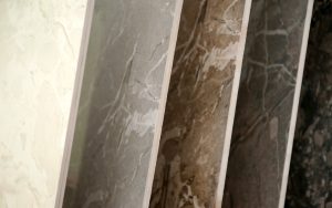 Inspection process of porcelain quality: professional checking the durability, scratch resistance, and finish of porcelain tiles